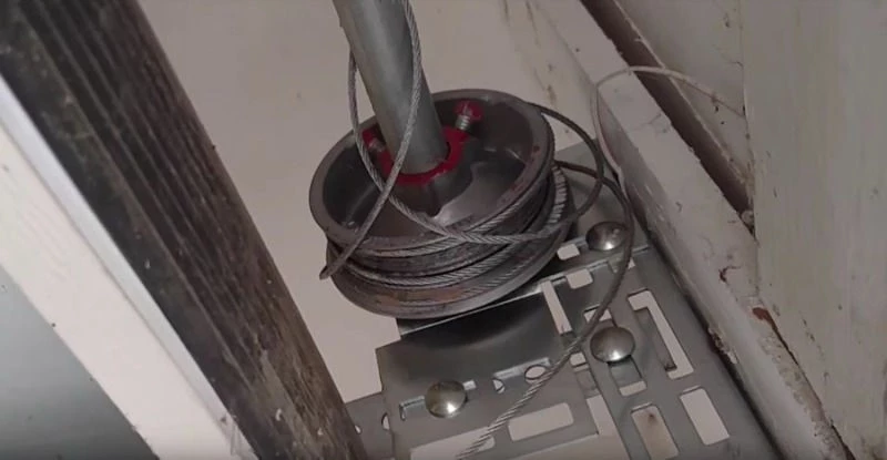 broken garage door cable in need of repair